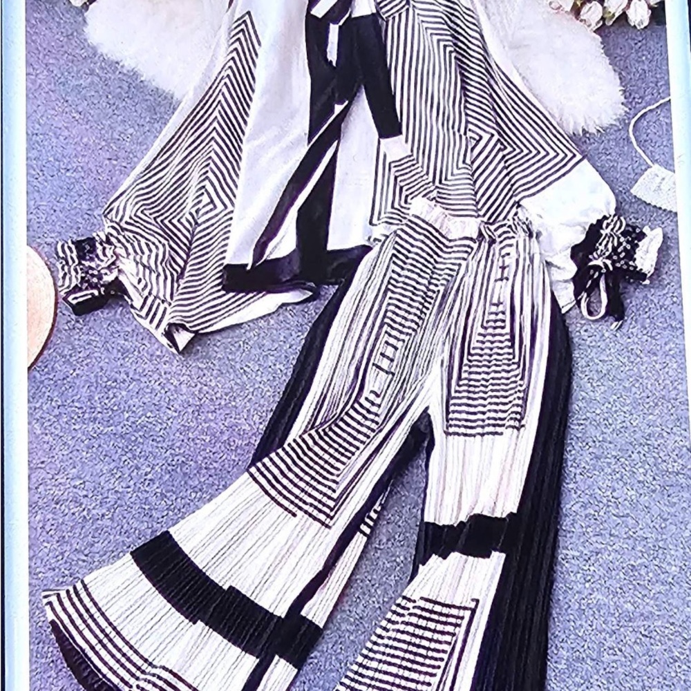 COPY - NbyNancy two piece black and white set size large NWT poncho top,…
